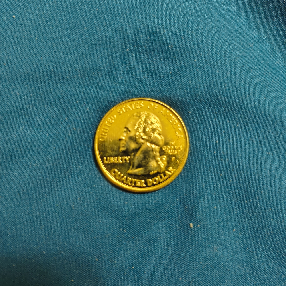 Gold Quarter Dollar Coin